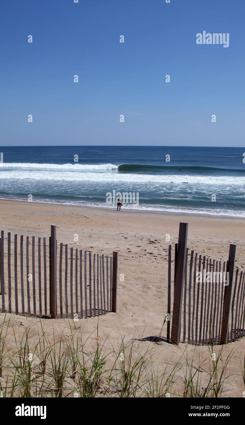 Summer is coming, lone bather and trail to Beach New Jersey shore, USA Stock Photo
