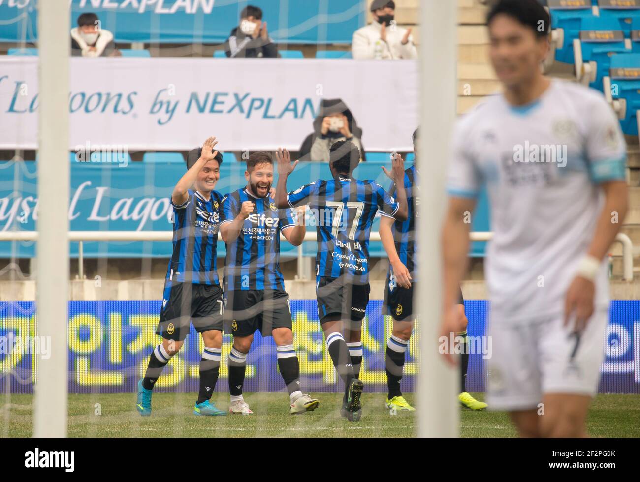 Incheon, South Korea. 06th Mar, 2021. (L-R) Goo Boon-Cheul, Costa Rican midfielder Elias Aguilar and Brazilian striker Guilherme Ferreira Pinto of Incheon United FC celebrate after Elias Aguilar scored a goal during the 2nd round of the 2021 K League 1 soccer match between Incheon United FC and Daegu FC at the Incheon Football Stadium.(Final score; Incheon United FC 2:1 Daegu FC) (Photo by Jaewon Lee/SOPA Images/Sipa USA) Credit: Sipa USA/Alamy Live News Stock Photo