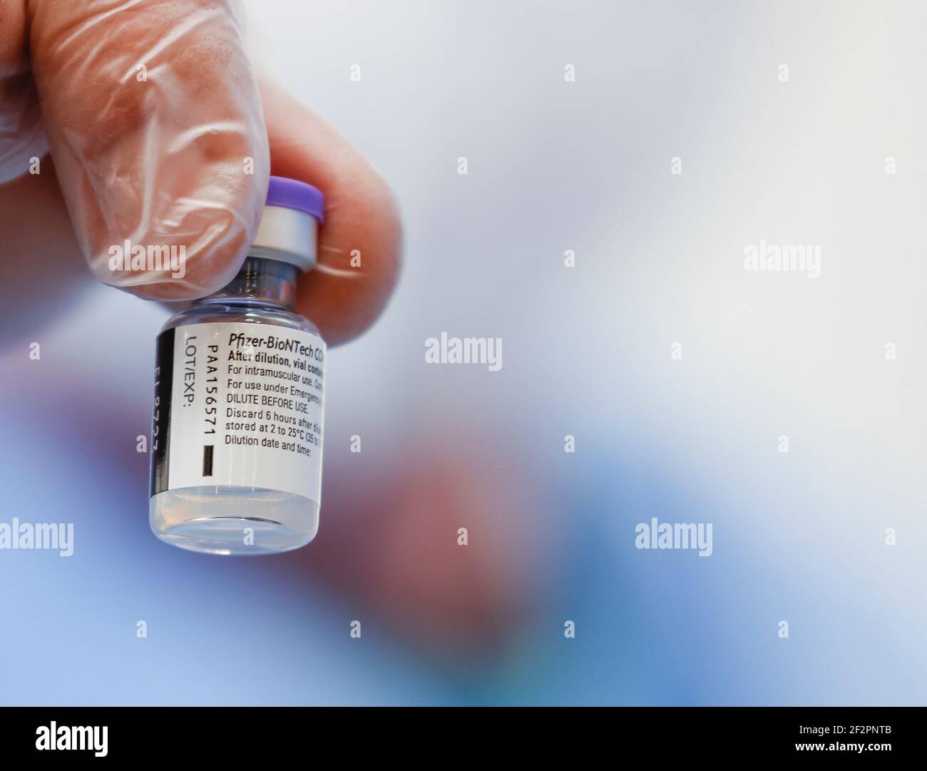 Essen, North Rhine-Westphalia, Germany - Vaccination start in the Corona Vaccination Center Essen, the vaccination syringes, BioNTech-Pfizer vaccine, 6 vaccination doses are drawn from an ampoule onto vaccination syringes. Stock Photo