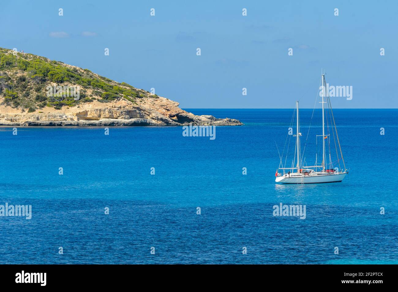 Ibiza, Spain - September 27, 2017: Cala Xarraca beach on the north coast of the island of Ibiza. Crystal clear waters on this almost wild beach, where Stock Photo