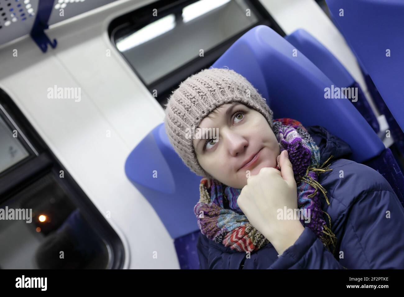 Tired woman on the subway train hi-res stock photography and images - Alamy