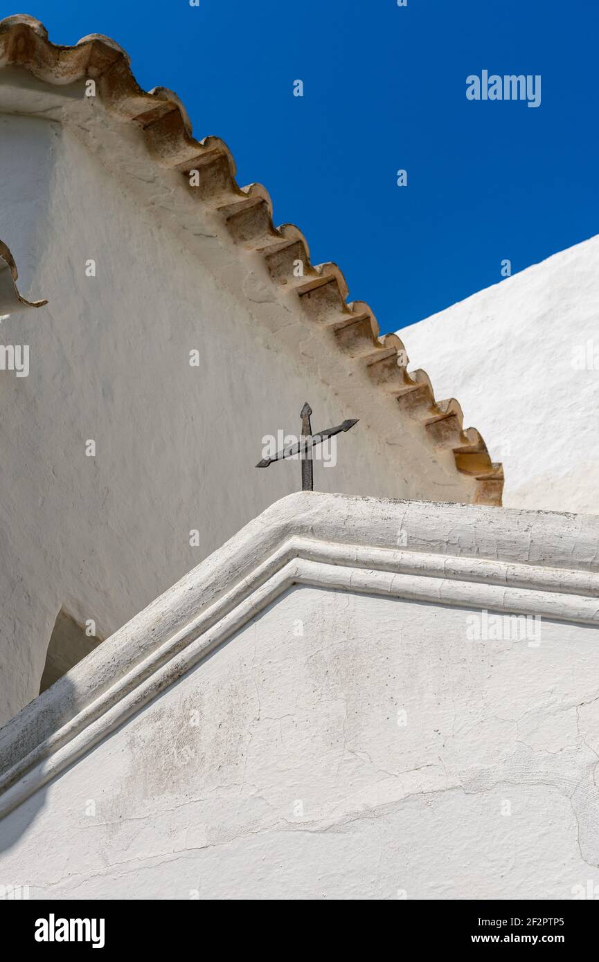 Monument 'Puig de Missa'. Architectural detail. The typical construction of the island of Ibiza in white lime. Detail of the construction in a church. Stock Photo