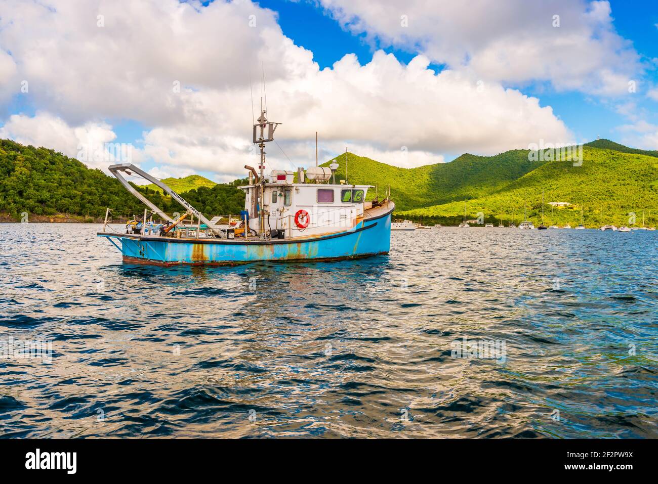 Old fishing boat in the Caribbean sea in Saint Martin Stock Photo