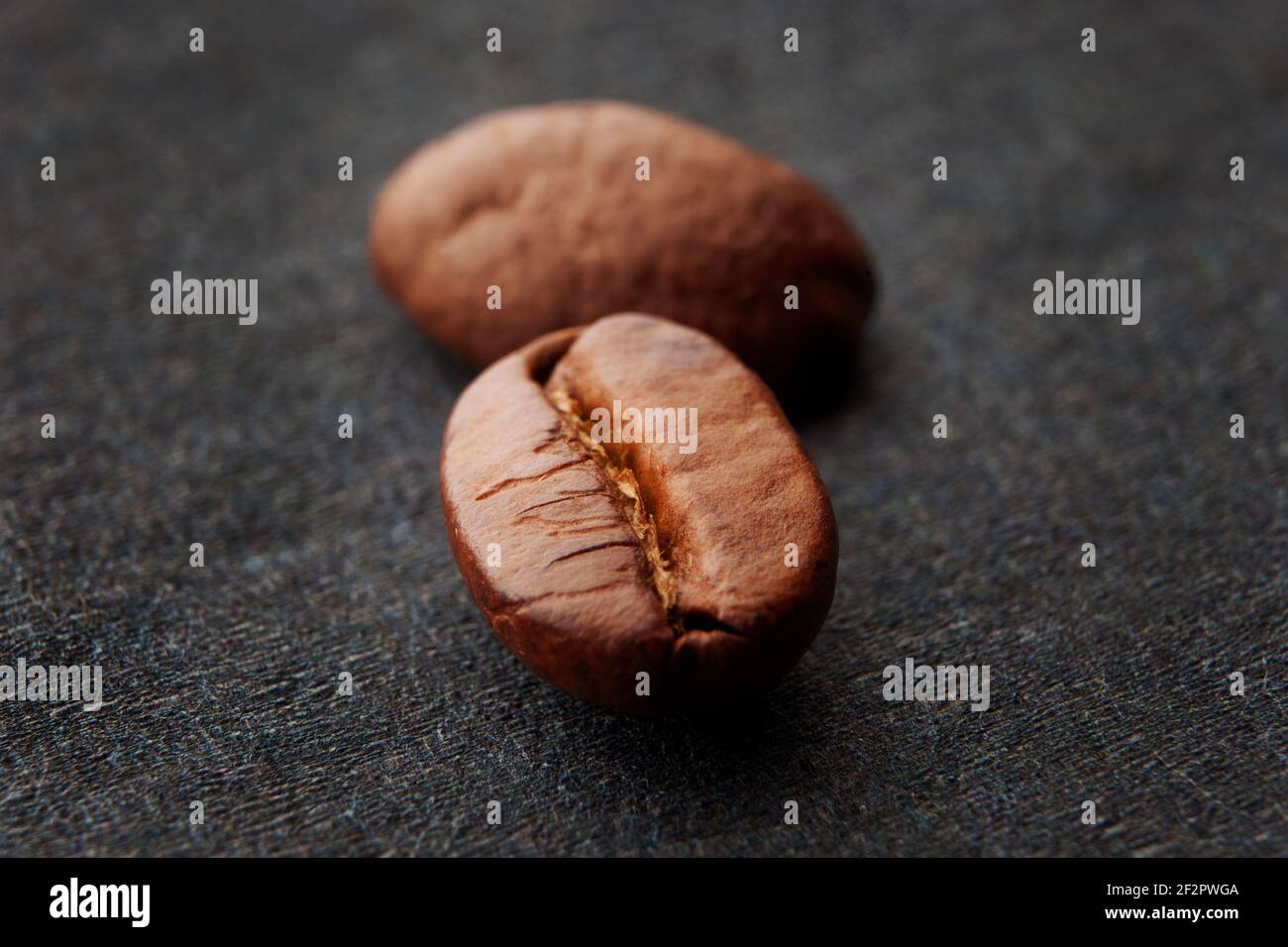 Close up of fresh, roasted coffee bean. Macro coffee bean Stock Photo ...