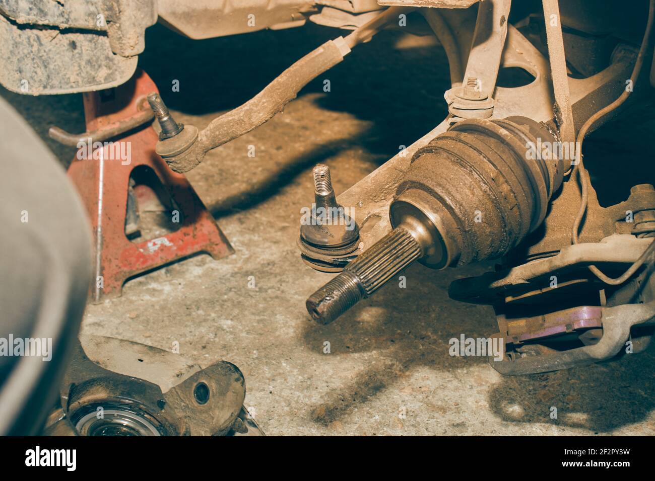 Lower Arm Ball Joint and Outer CV Joint and Brake Caliper and