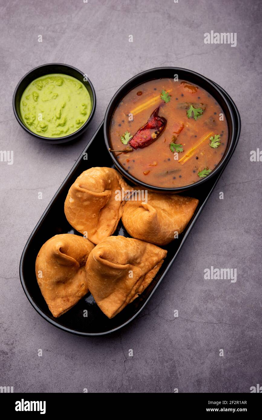 South indian Sambar Samosa Chutney it's a fusion food in which sambhar is from South and Samosas