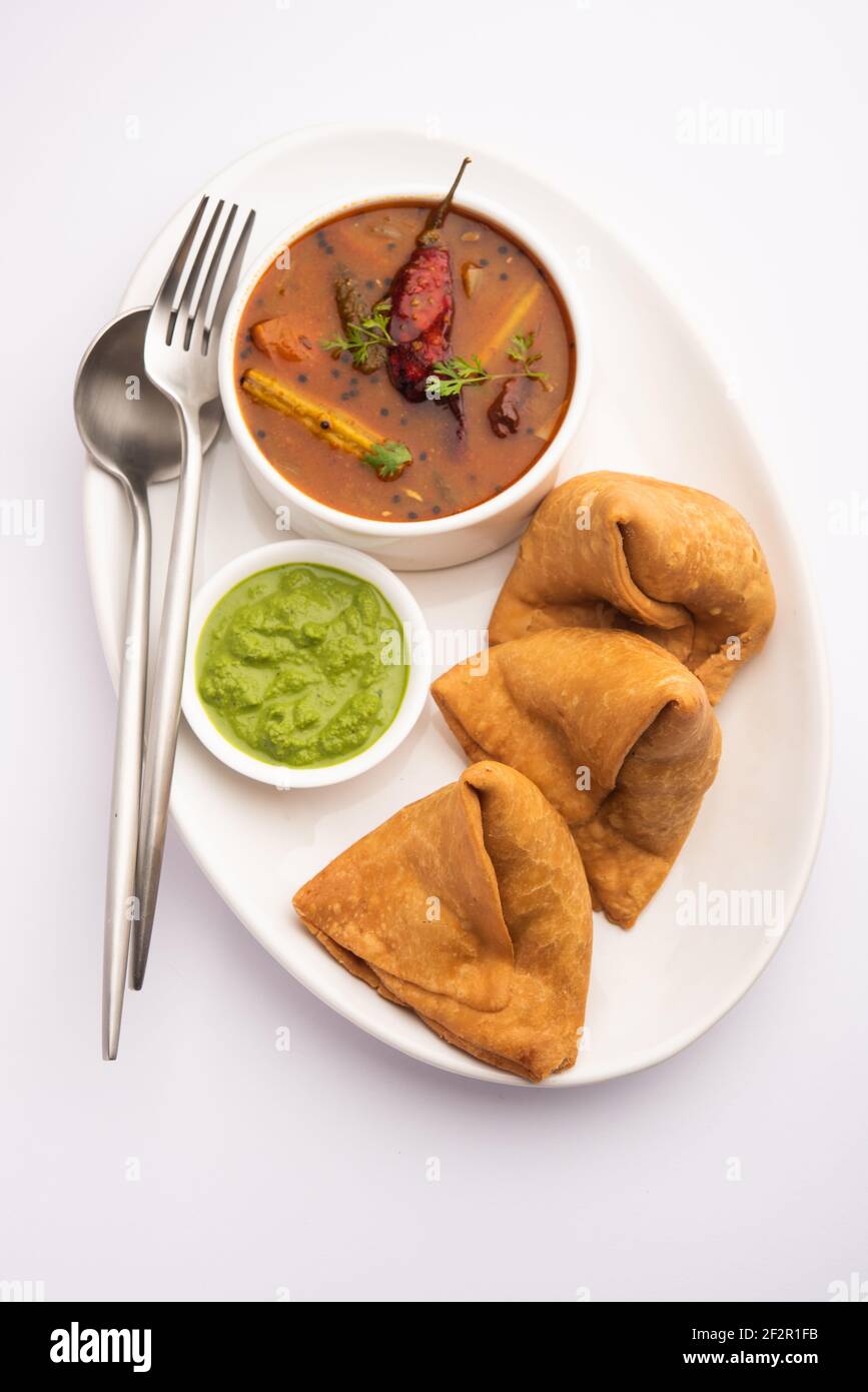 South indian Sambar Samosa Chutney it's a fusion food in which sambhar is from South and Samosas