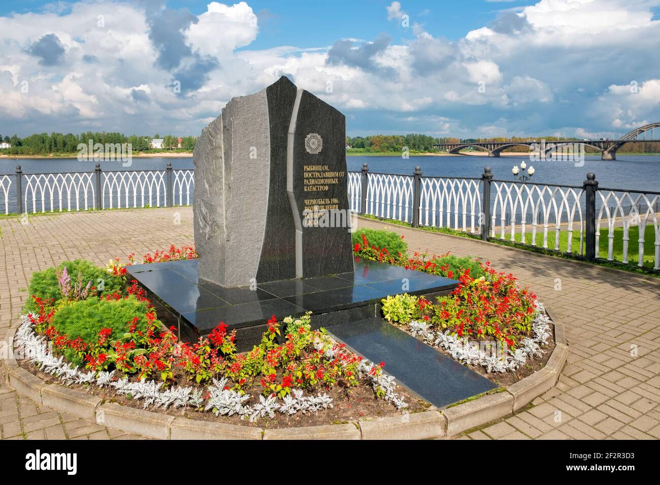 RYBINSK, RUSSIA / AUGUST 15,2020: Monument to victims of radiation catastrophes on the background of the cloudy sky on a summer day, Nikolsky Boulevar Stock Photo