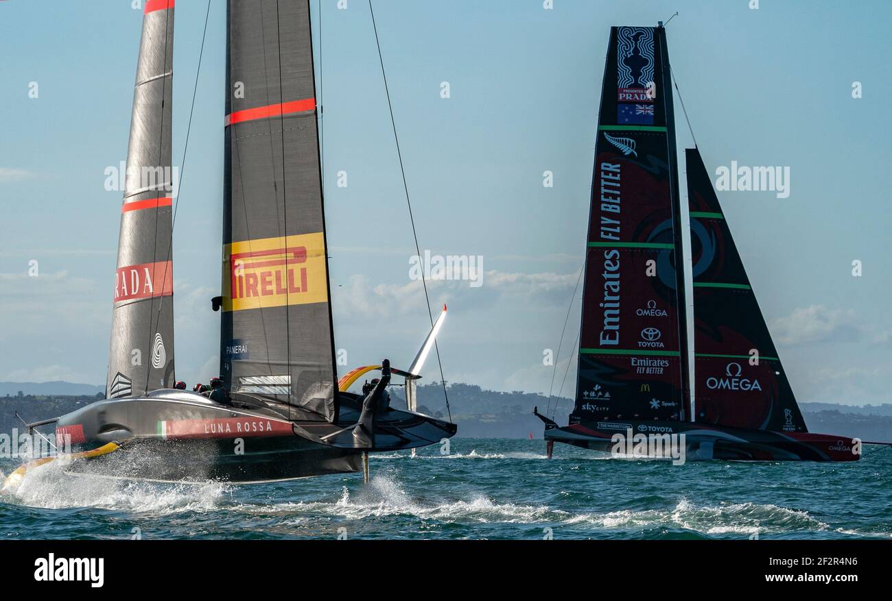 Auckland, New Zealand, 13 March, 2021 -  Defender's  Emirates Team New Zealand (ETNZ), skippered by Peter Burling on Te Rehutai and Italian challengers Luna Rossa Prada Pirelli, co-helmed by Jimmy Spithill and Francesco Bruni on Luna Rossa, during Day 3, Race 6, of the 36th America's Cup.  Credit: Rob Taggart/Alamy Live News Stock Photo