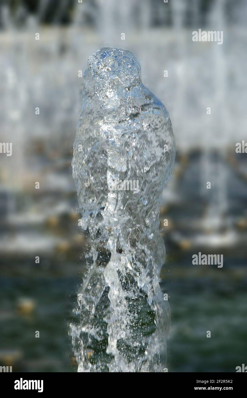Large vertical water jet fountain Stock Photo Alamy