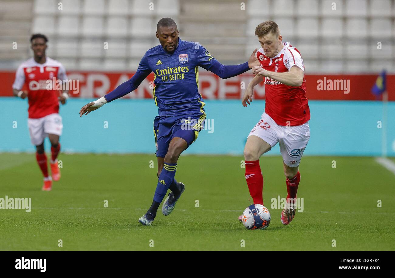Karl TOKO EKAMBI of LYON and Thomas FOKET fro REIMSin action during the ...