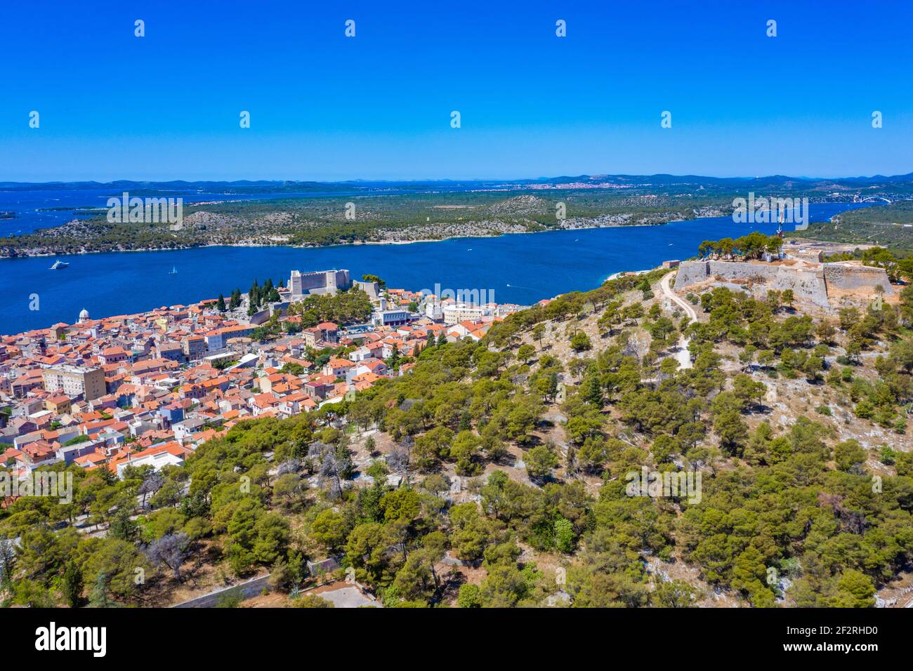 Aerial view of Croatian town Sibenik with Saint michael's fortress, Saint John's Fortress and Sveti Ante channel Stock Photo