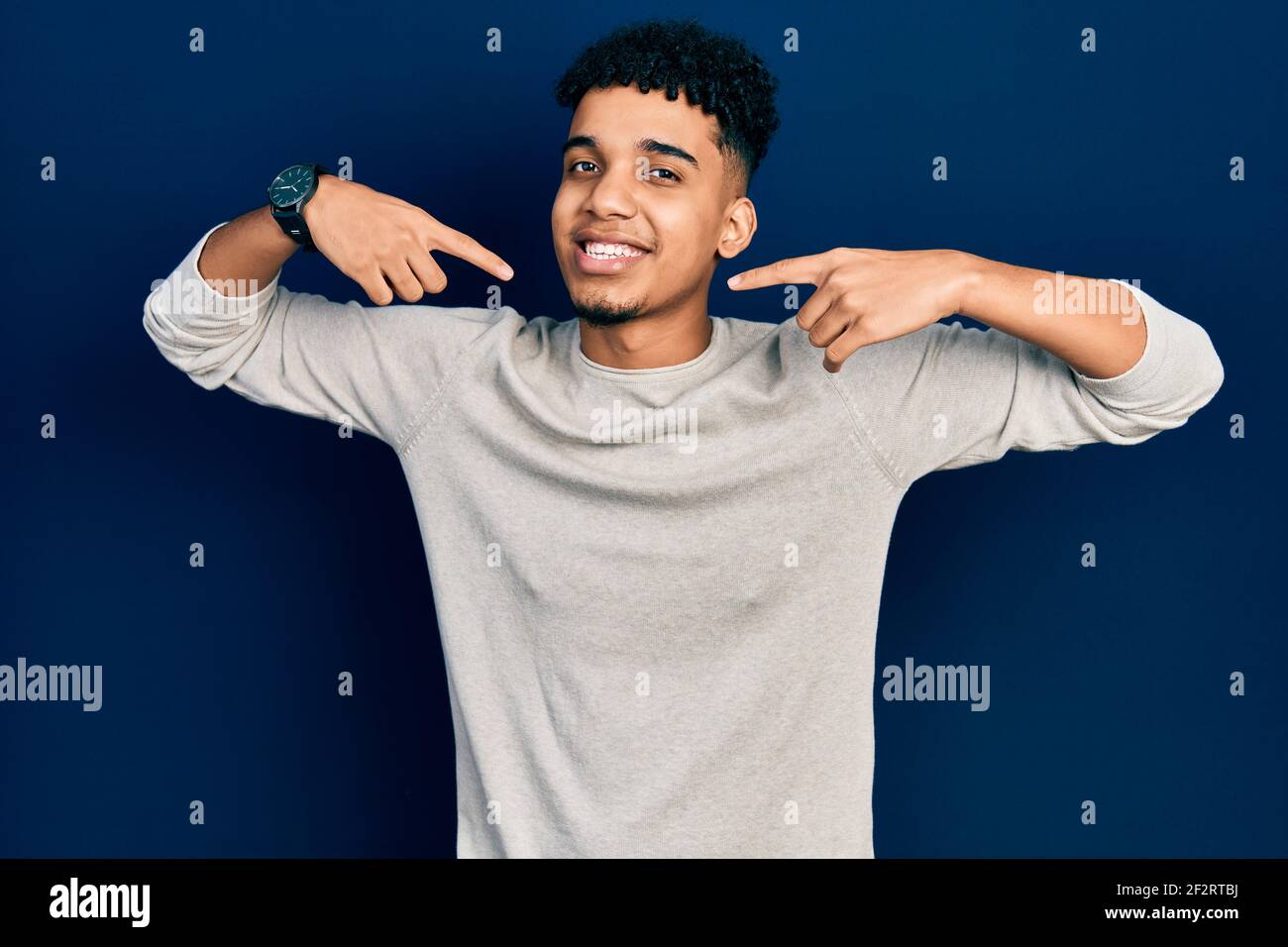 Young african american man wearing casual clothes smiling cheerful ...