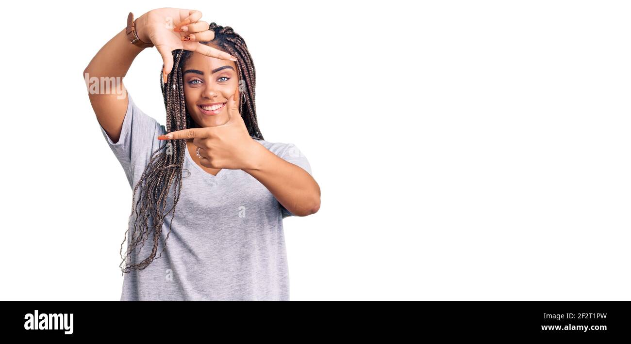 Young african american woman with braids wearing casual clothes smiling ...