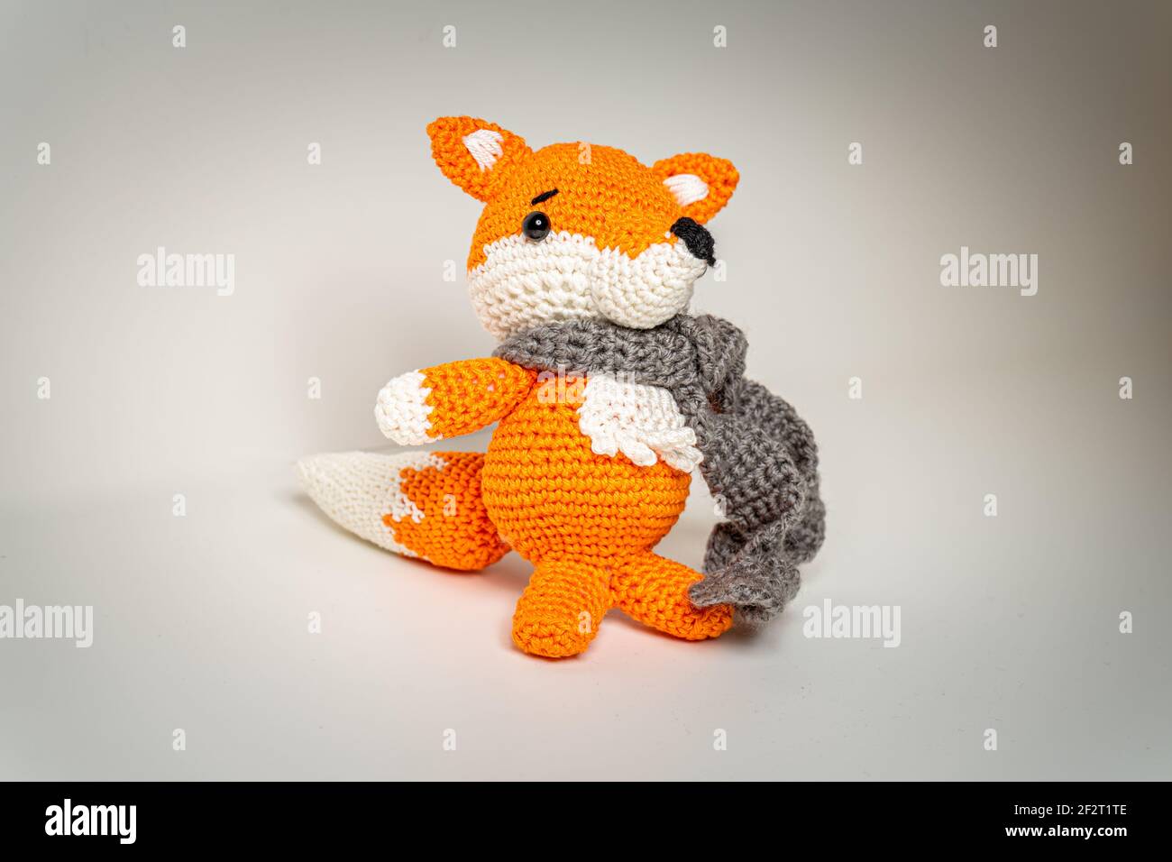 Amigurumi Orange Fox with Scarf out of Wool Bavaria Stock Photo