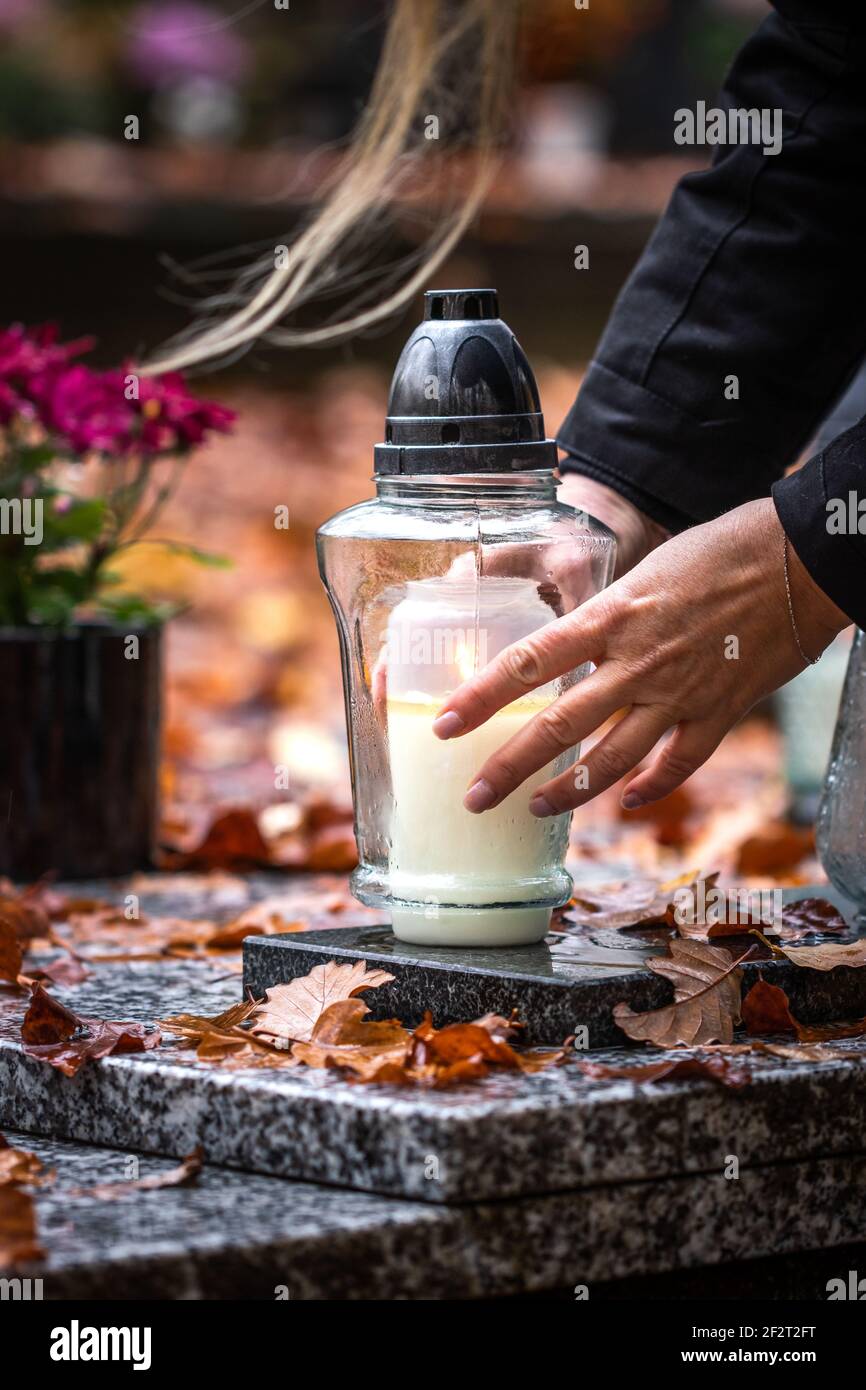 Grave Candle At Cemetery High Resolution Stock Photography and Images