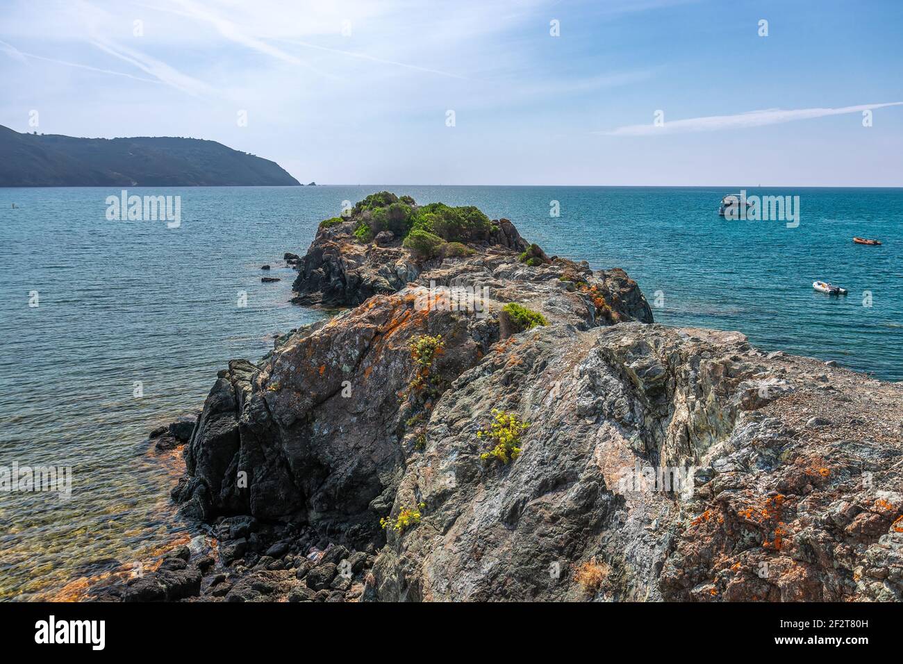 View of the picturesque cape covered with moss and the emerald ...