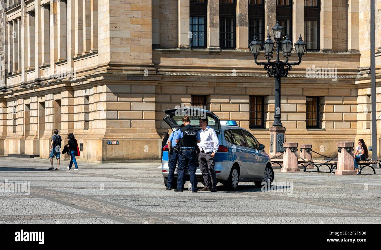 Berlin police on a mission at the gendarmenmarkt Stock Photo