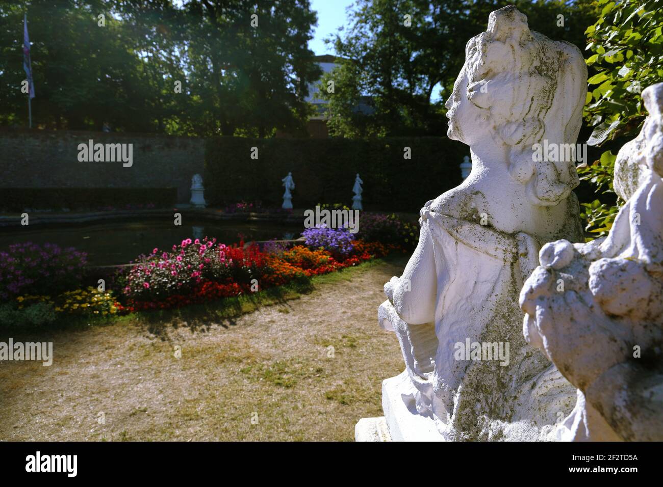 statue in garden Stock Photo Alamy
