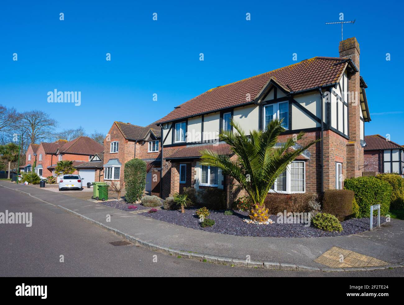 2 storey 21st century modern detached house on a corner in a new housing estate in Windsor Drive, Rustington, West Sussex, England, UK. Stock Photo