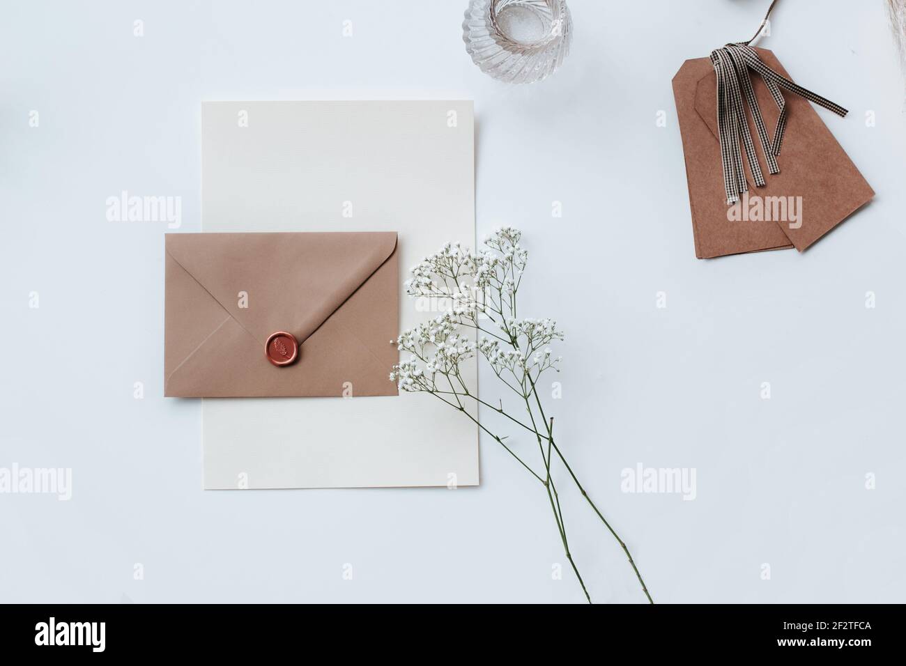 Brown Envelop flat lay for wedding, birthday, business invitation beautiful stationery for Instagram or digital marketing business Stock Photo