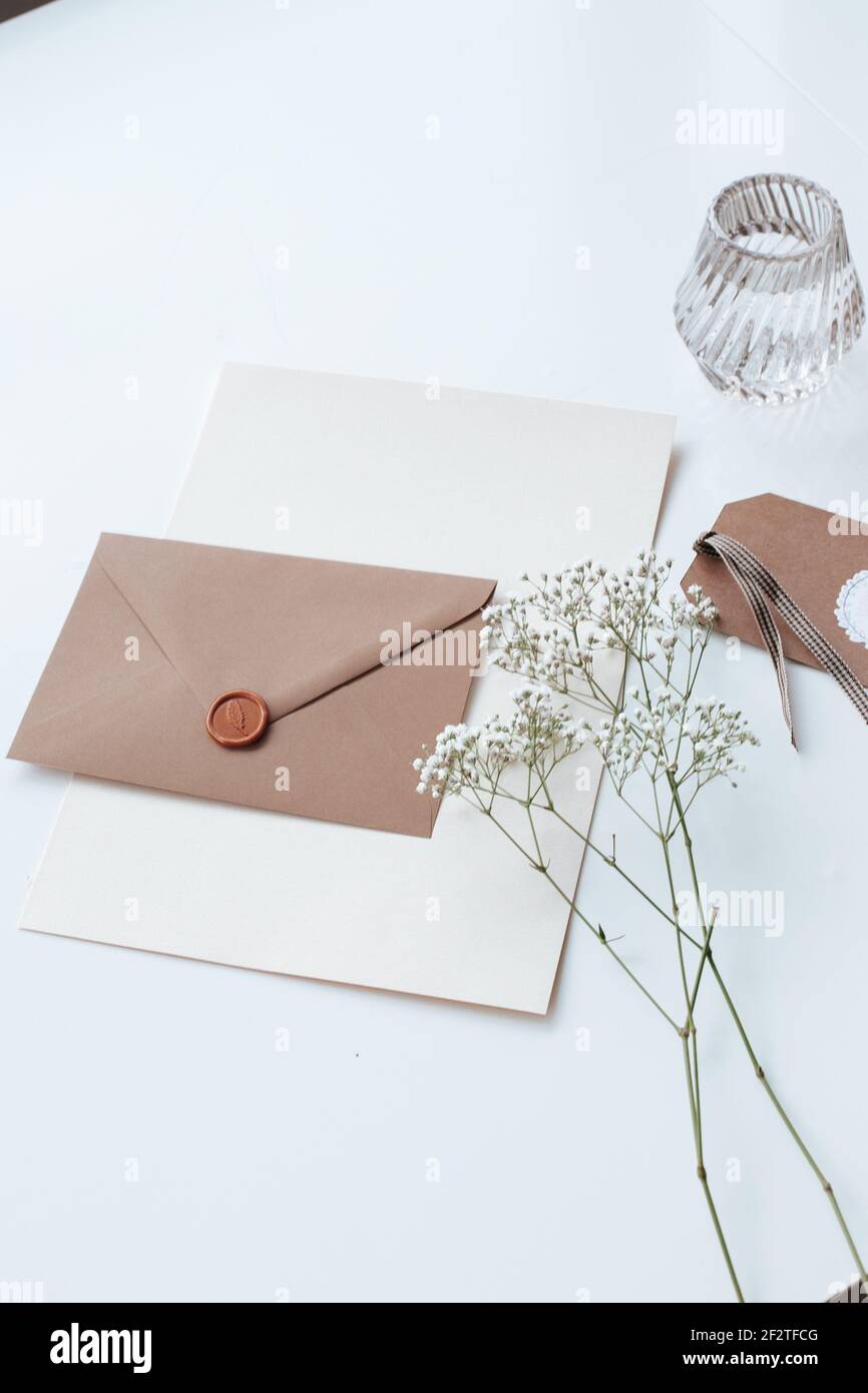 Brown Envelop flat lay for wedding, birthday, business invitation beautiful stationery for Instagram or digital marketing business Stock Photo