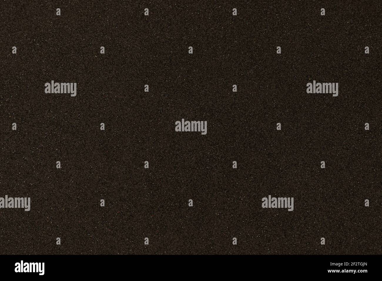 Black texture with micro-relief and glitter. Black glitter texture Stock Photo