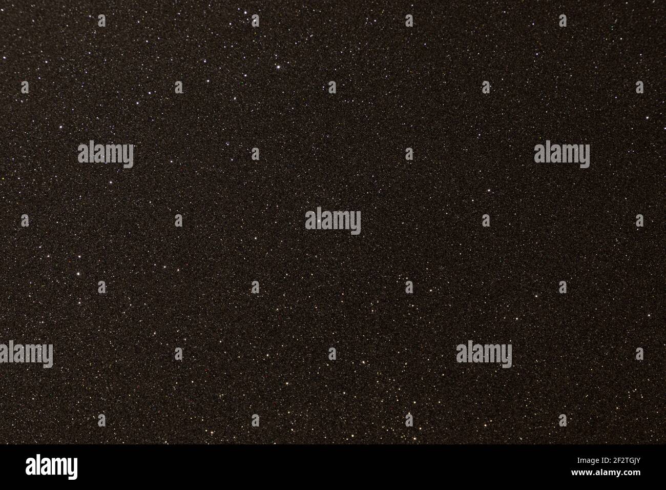 Black texture with micro-relief and glitter. Black glitter texture Stock Photo