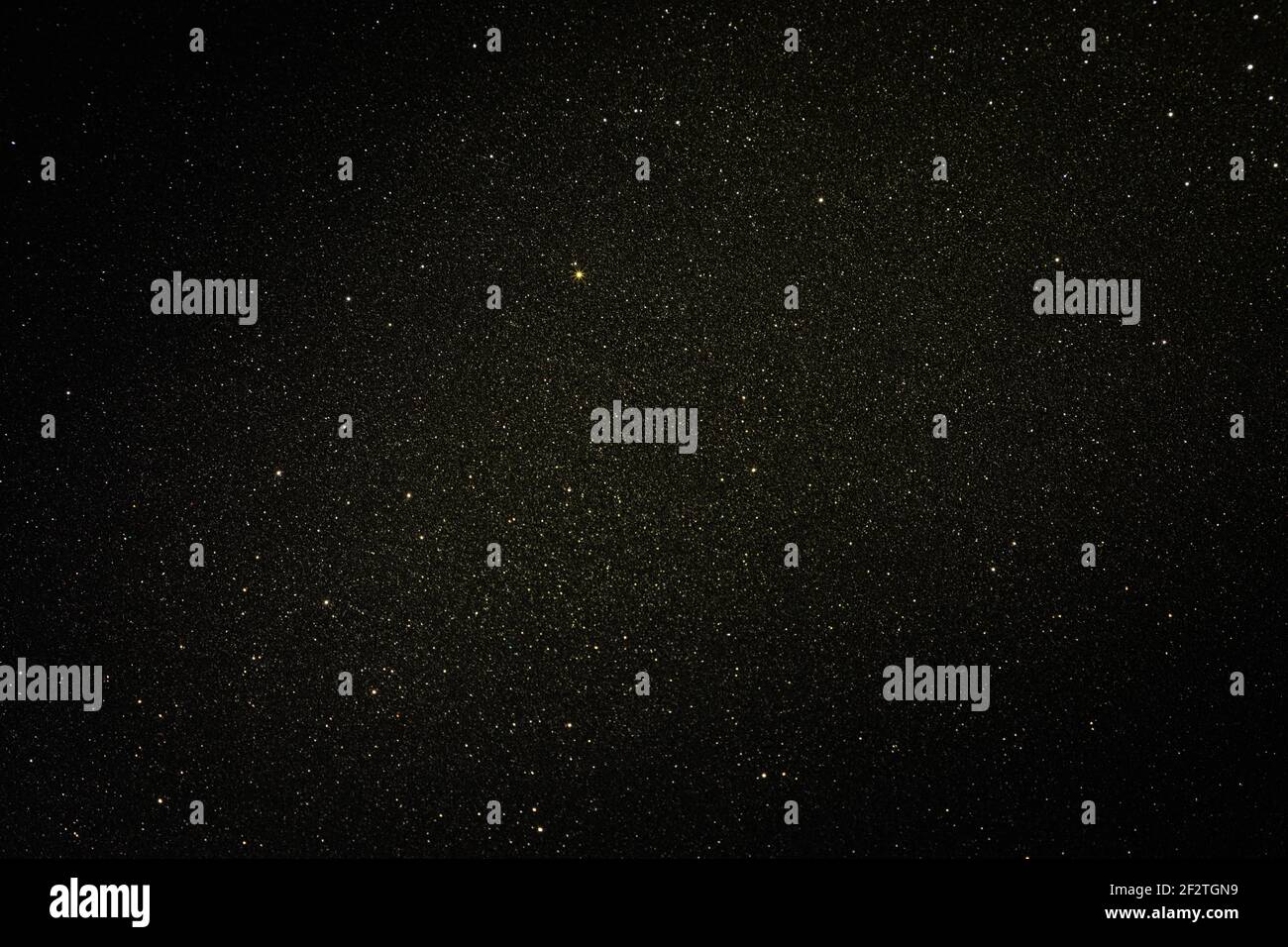 Black texture with micro-relief and glitter. Black glitter texture with illuminated center Stock Photo