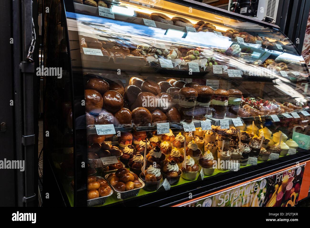Naples, Italy - September 9, 2019: Display with rum baba or baba au rhum in  a candy shop in the old town of Naples, Italy Stock Photo - Alamy
