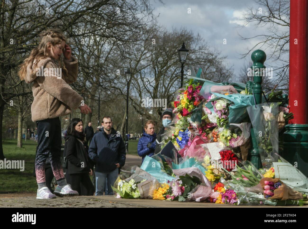 London UK 13 March 2021 Flowers lay in the bandstand in Clapham Common in memory of Sarah Everard, a planned vigil this evening has been canceled by organisers, Anna Birley, an organiser of Reclaim These Streets, said they did not want to put women at risk of fixed-penalty notices. Paul Quezada-Neiman/Alamy Live News Stock Photo