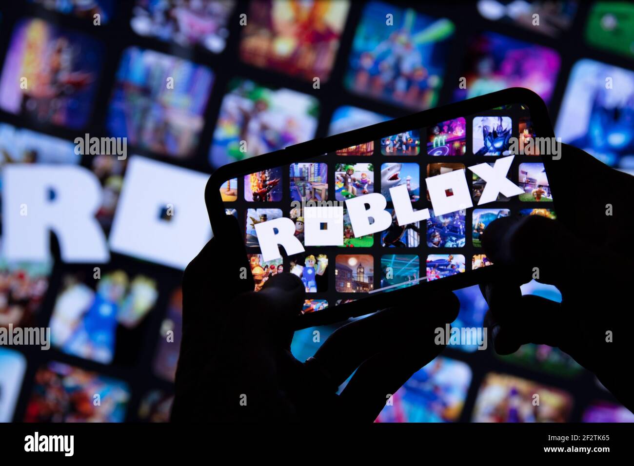 In this photo illustration Roblox logo seen displayed on a smartphone.  Roblox is a multiplayer online game and video game creation system Stock  Photo - Alamy