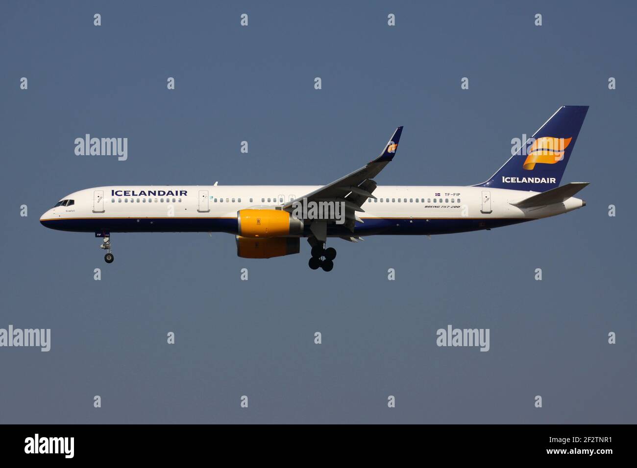 Icelandair Boeing 757-200 with registration TF-FIP on final for runway 25L of Frankfurt Airport. Stock Photo