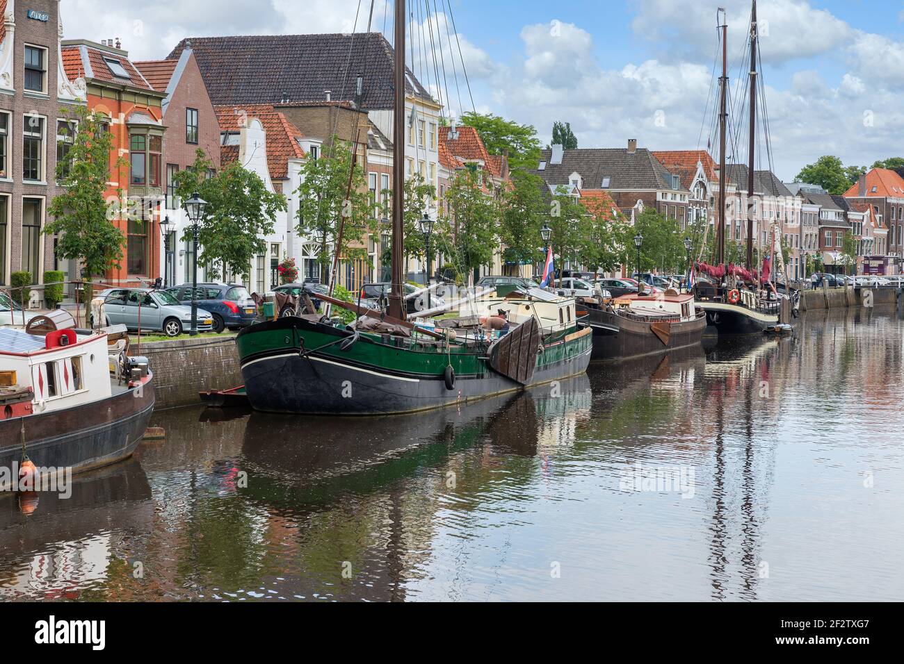 Cityscape Dutch city Zwolle with canal and old sailing ships Stock Photo Alamy