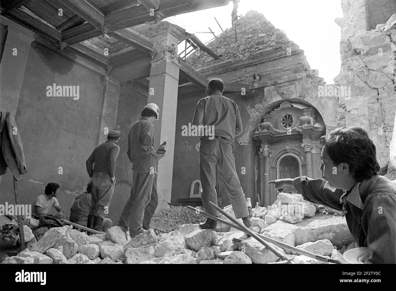 Friuli (Northern Italy), two months after the earthquake of May 1976; volunteers recover objects of art from a church Stock Photo