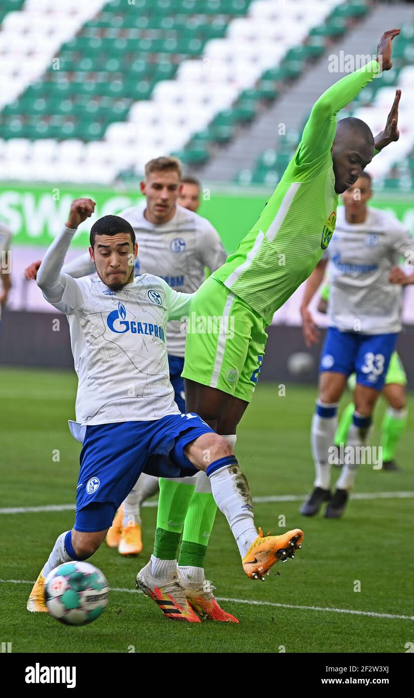 Wolfsburg Germany 13th Mar 2021 Football Bundesliga Vfl Wolfsburg Fc Schalke 04 Matchday 25 Volkswagen Arena Schalke S Defender William De Asevedo Furtado And Wolfsburg S Midfielder Josuha Guilavogui R Credit Swen Pfortner Dpa Alamy