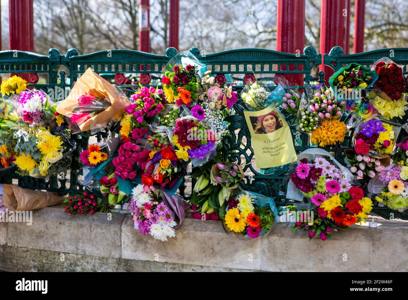 London, UK. 13th Mar, 2021. Flowers are being left at the Clapham Common bandstand not far from where Sarah Everard went missing during the vigil organized by Reclaim the streets.A London Metropolitan Police officer has been charged with the kidnap and murder of Sarah Everard (33 year old). Credit: SOPA Images Limited/Alamy Live News Stock Photo
