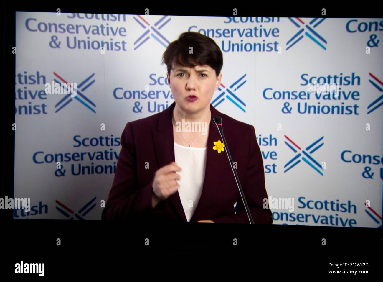 Edinburgh, Scotland, UK. 13th Mar, 2021. Pictured: Ruth Davidson MSP, Scottish Conservative Holyrood Leader, seen speaking at Scottish Conservatives National Conference (SCC21). Ruth said: “Scotland can't afford another five years of this divisive, distracting, destructive SNP obsession. “In the midst of a global pandemic, when the only priority should be pulling together to defeat it, to get the country back on its feet, the SNP's priority is to divide us all over again. Credit: Colin Fisher/Alamy Live News Stock Photo