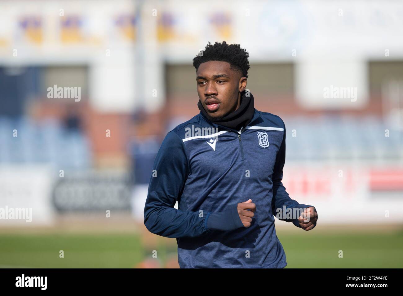 Dens Park, Dundee, UK. 13th Mar, 2021. Scottish Championship Football, Dundee FC versus Arbroath; Malachi Fagan-Walcott of Dundee during the warm up before the match Credit: Action Plus Sports/Alamy Live News Stock Photo