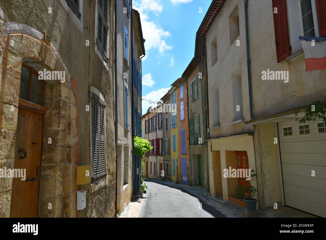 Provençal style houses and local shops in the historic center of Valensole, in AlpesdeHaute