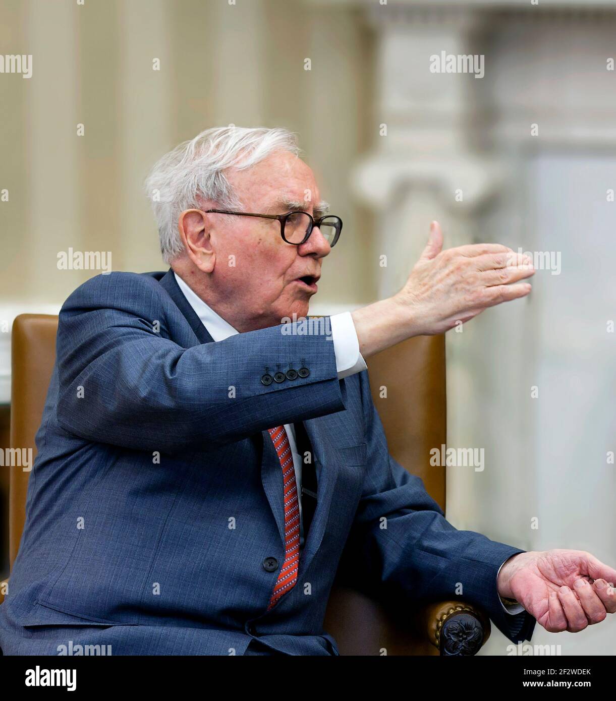 Warren Buffet. Portrait of the  billionaire American investor and CEO of Berkshire Hathaway, Warren Edward Buffett (b. 1930) in a meeting with President Obama in the White House Oval Office, July 2011. Official White House Photo. Stock Photo