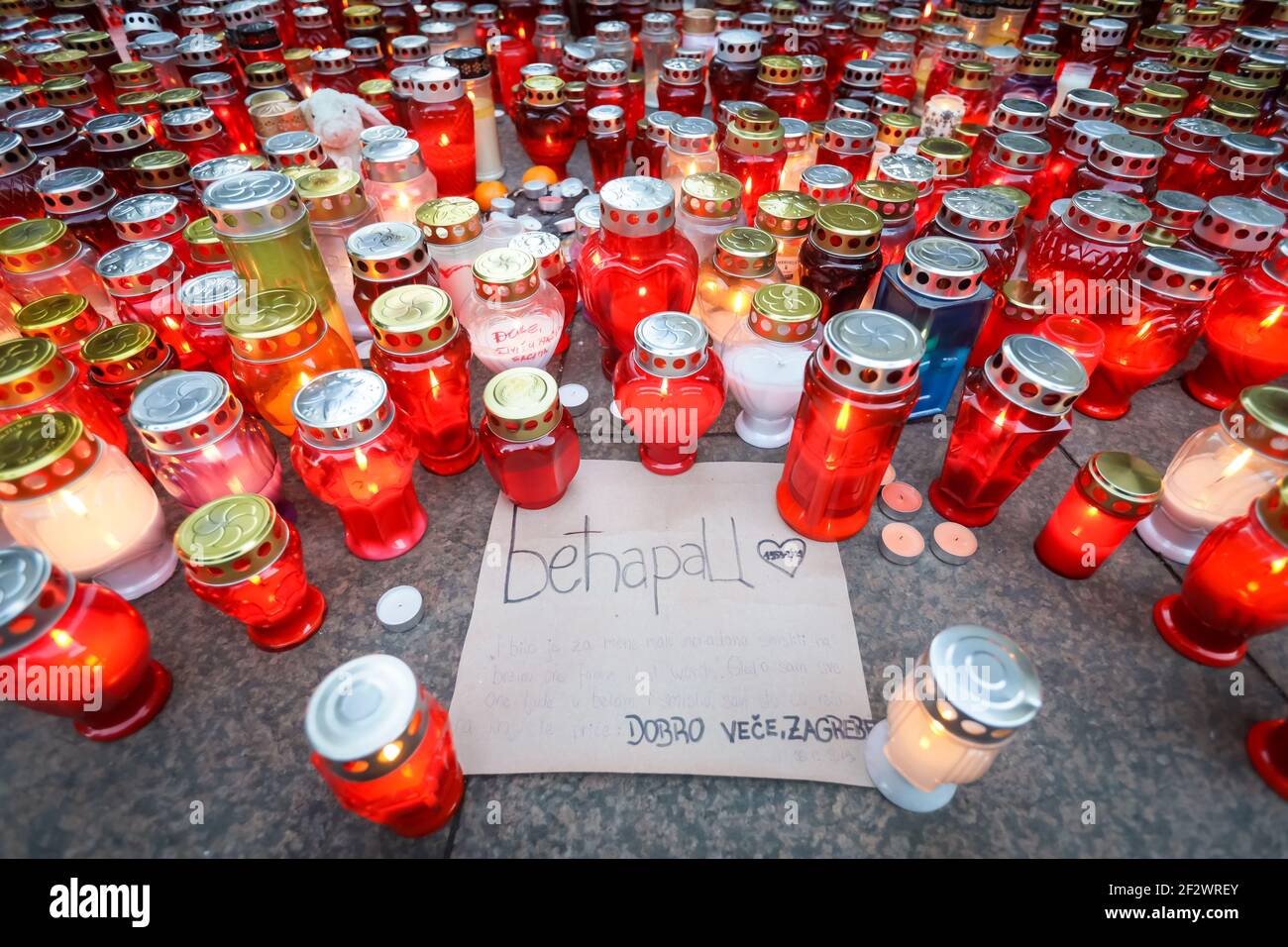 In Frane Petrica Street, near the lighting pole, people pay tribute with lighted lamps, flowers, plush toys, various messages and verses from the song Stock Photo