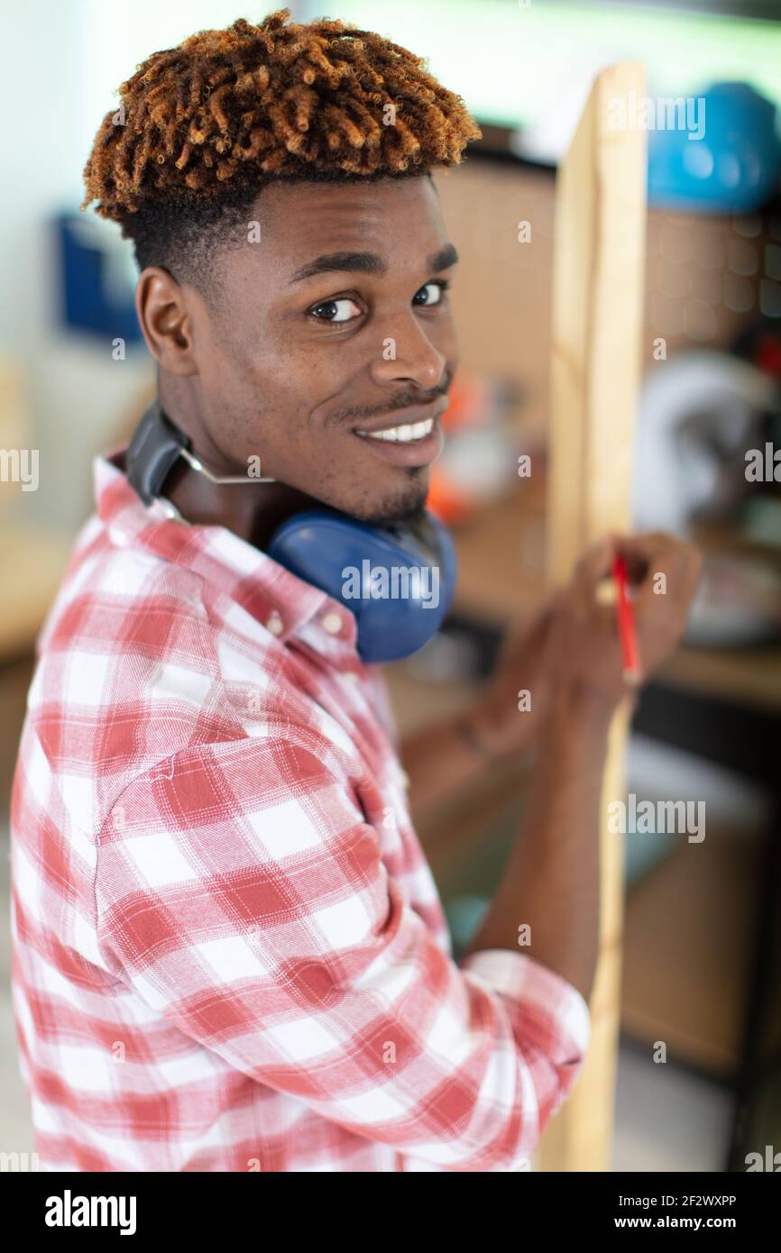 happy young man looking at the camera Stock Photo - Alamy