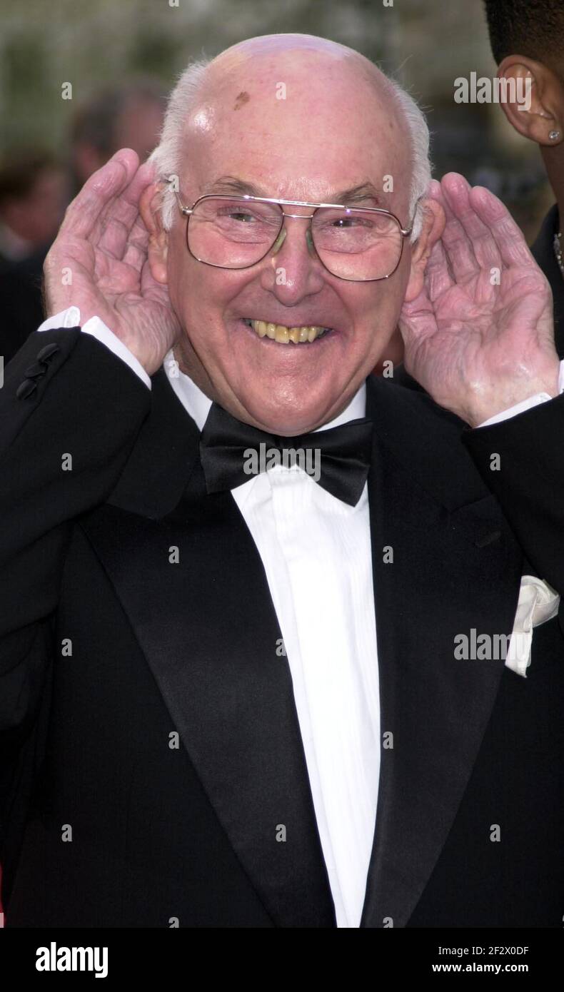 File photo dated 21-04-2002 of Motor racing commentator Murray Walker arrives at the British Academy Television Awards. Issue date: Issue date: Sunday March 13, 2021. Stock Photo