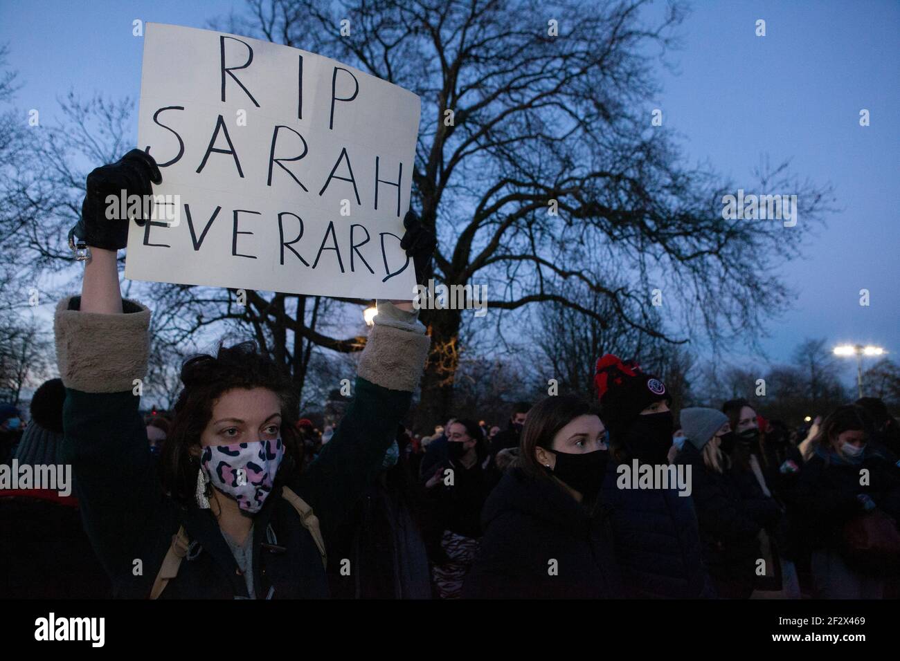 London, UK, 13 March 2021: Despite Metropolitan Police warnings hundreds of people gathered on Clapham Common at the bandstand as a vigil for  the murdered woman Sarah Everard and to protest more generally about police and society's attitudes to male violence and women's freedom. Anna Watson/Alamy Live News Stock Photo