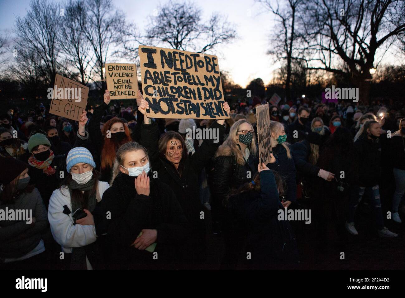 London, UK, 13 March 2021: Despite Metropolitan Police warnings hundreds of people gathered on Clapham Common at the bandstand as a vigil for  the murdered woman Sarah Everard and to protest more generally about police and society's attitudes to male violence and women's freedom. Anna Watson/Alamy Live News Stock Photo