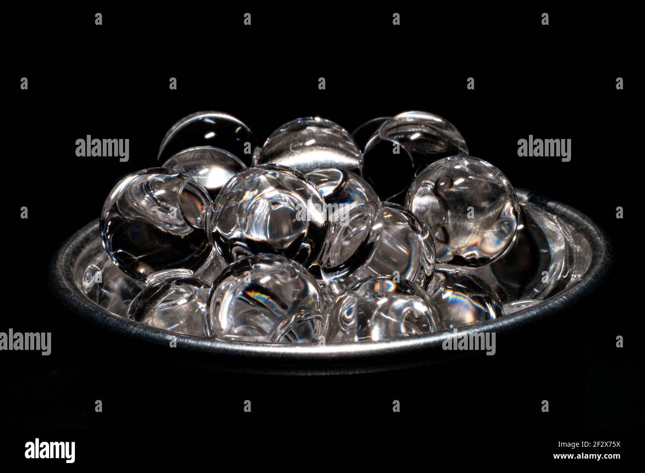 Gray caviar pearls in black background with copy space in a macro view Stock Photo