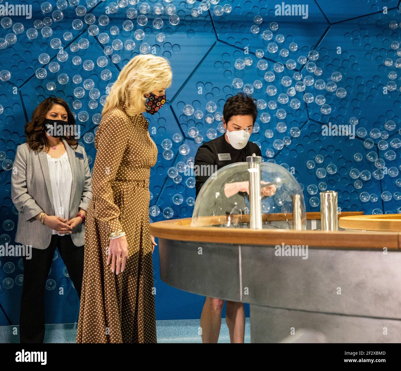 Tanya Durand, Executive Director of Greentrike, right, shows U.S First Lady Dr. Jill Biden around the Children's Museum at Joint Base Lewis-McChord March 9, 2021 near Tacoma, Washington. Stock Photo