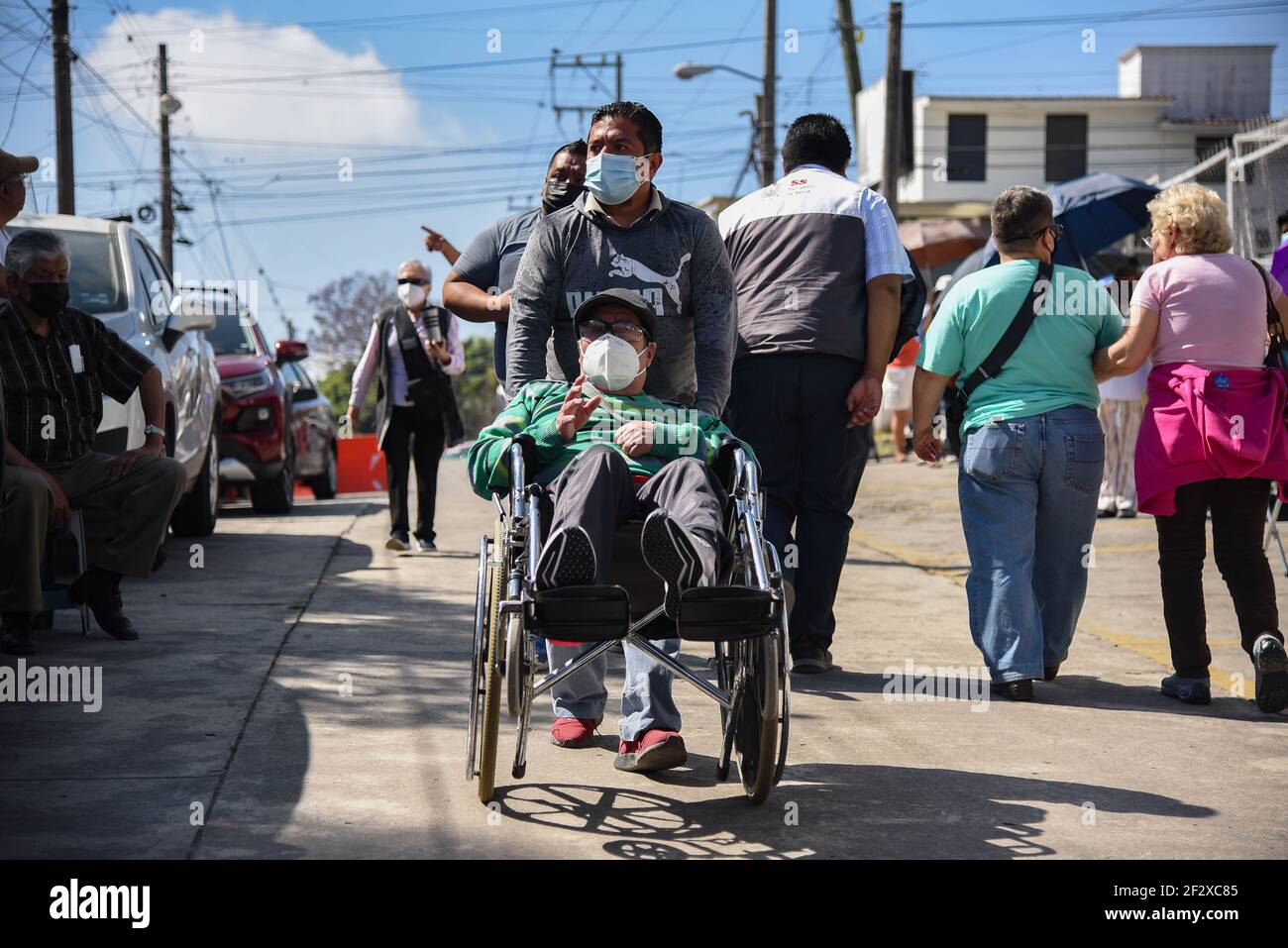 Xalapa, Mexico. March 13, 2021: Thousands of older adults received the COVID-19 vaccine in the city of Xalapa. From early on they made lines and for their application they were sanitized and did body activation exercises. Credit: Hector Adolfo Quintanar Perez/ZUMA Wire/Alamy Live News Stock Photo