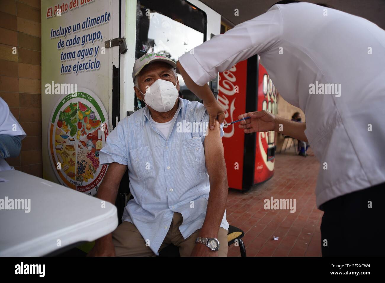 Xalapa, Mexico. March 13, 2021: Thousands of older adults received the COVID-19 vaccine in the city of Xalapa. From early on they made lines and for their application they were sanitized and did body activation exercises. Credit: Hector Adolfo Quintanar Perez/ZUMA Wire/Alamy Live News Stock Photo